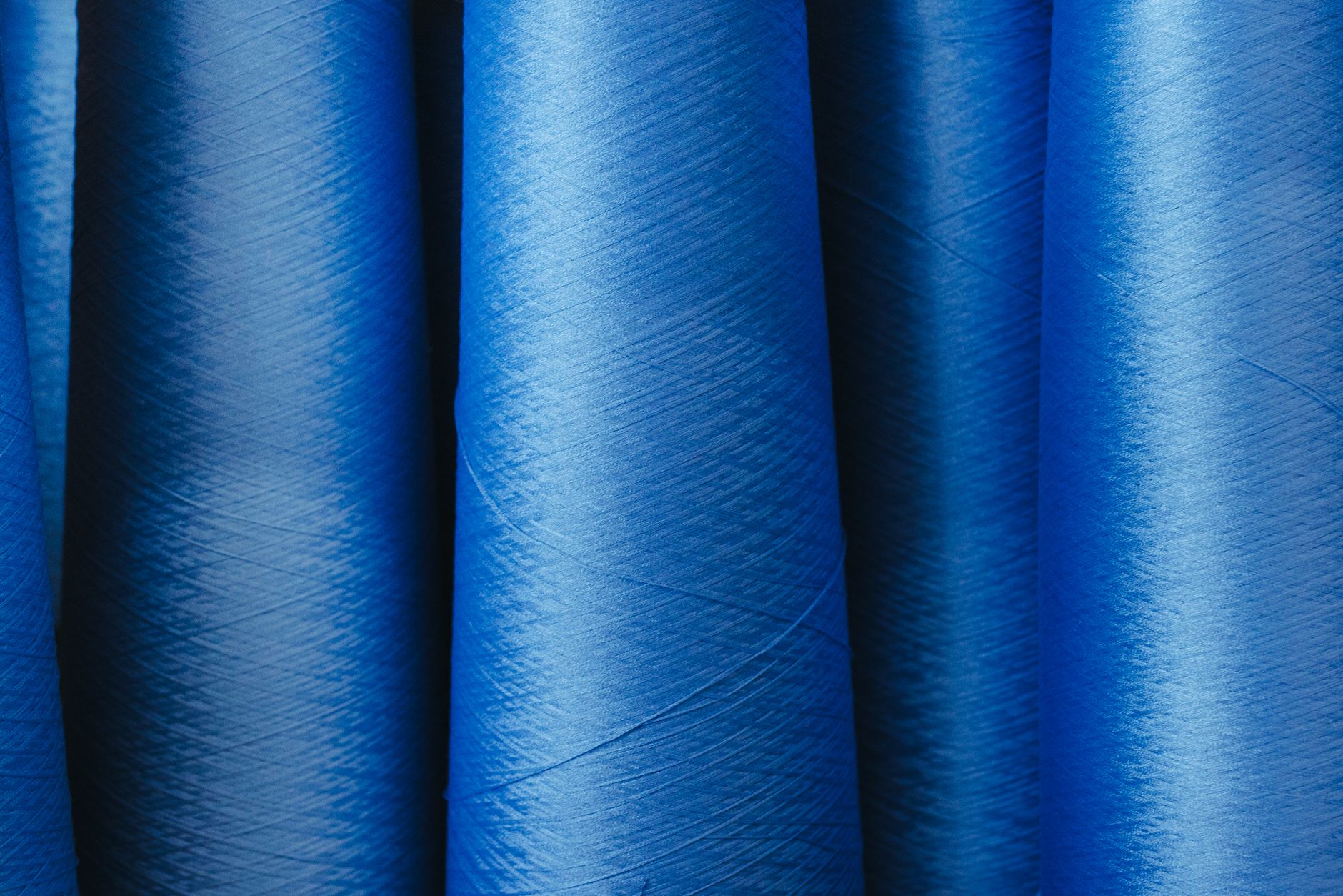 Cones of textile yarn